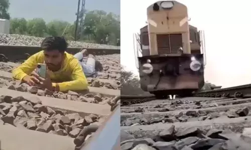 Viral Video, UP man lies on track, lets train pass over, Instagram reel, arrest