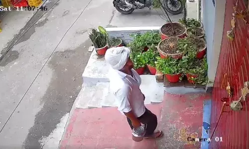 Milkman detained, Lucknow, spitting, milk, delivery