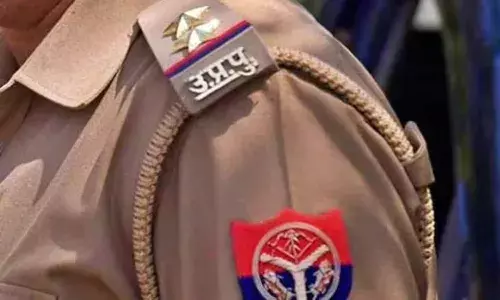 Clothes torn, molested, UP woman cop, attack, landlord, parking dispute