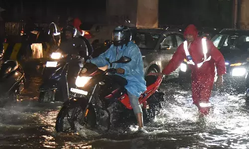 Three people were washed away , cloudburst ,Hyderabad , DRF, HYDRAA