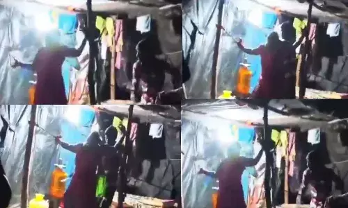 Andrapradesh, Prakasm District, Husband torturing wife with ropes
