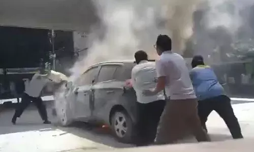 Car catches fire, refueling, fuel station, Hyderabad, Erramanzil