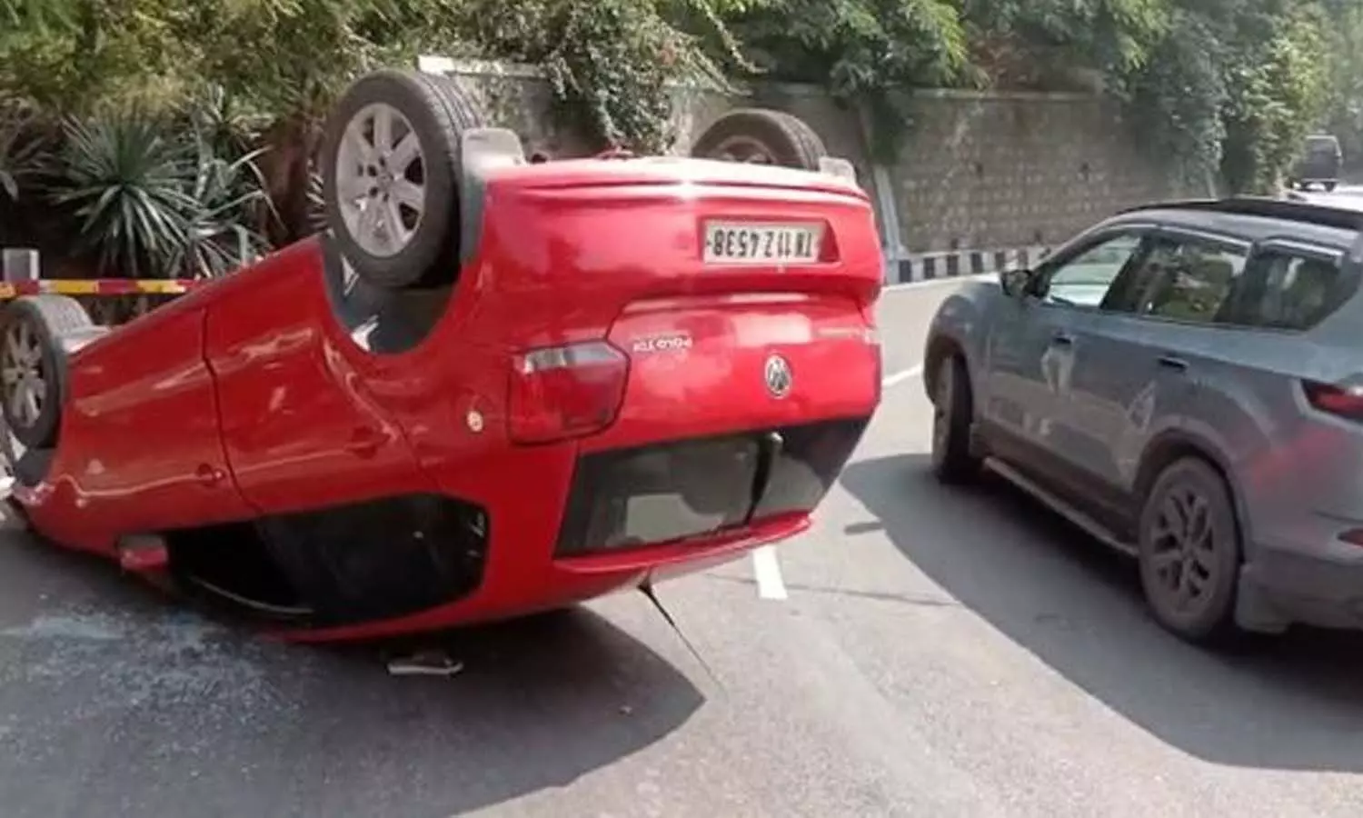 Car overturns,Tirumala Ghat road, three injured, APnews