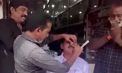 LDF worker shave,moustache, losing bet, Kerala local poll win, National news LDF worker shave,moustache, losing bet, Kerala local poll win, National news