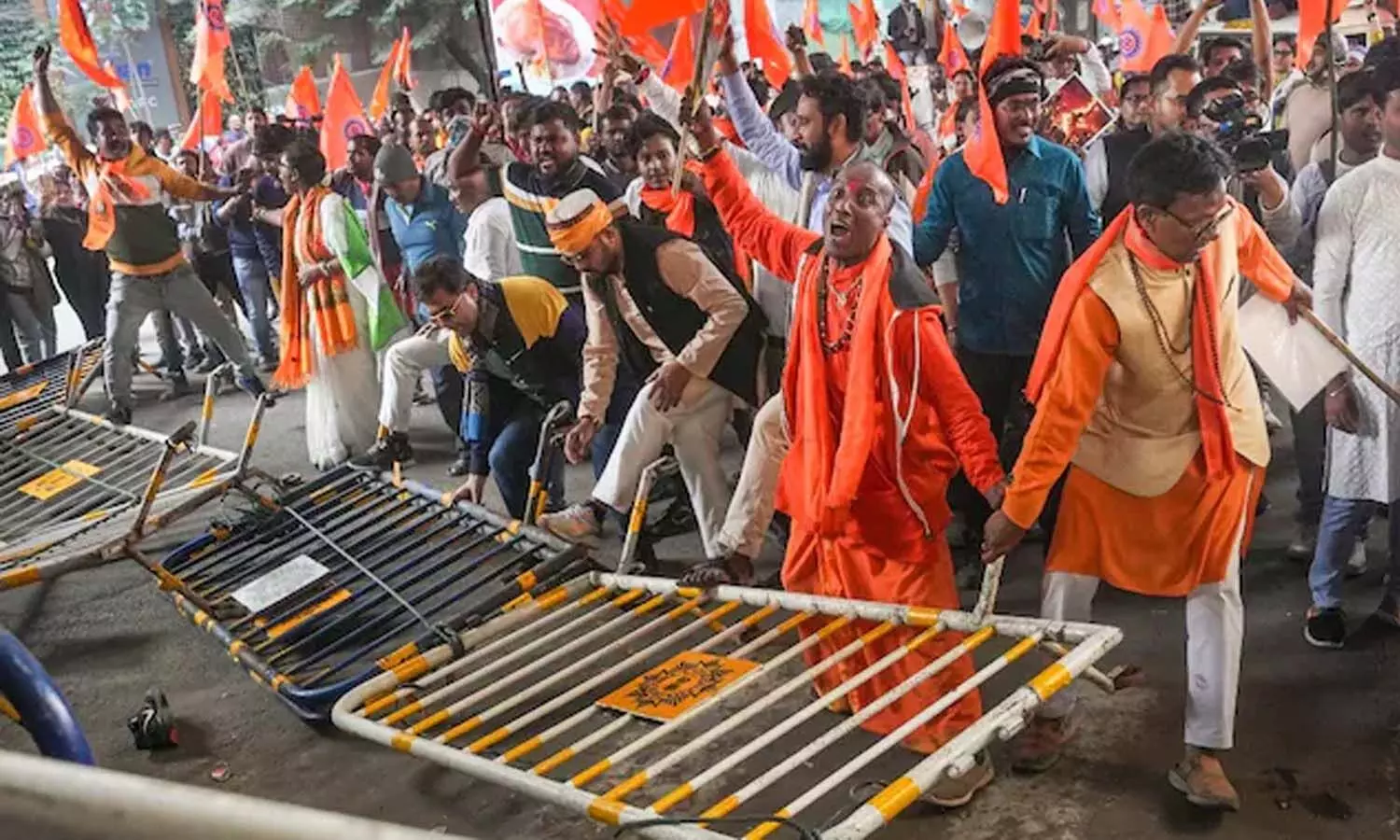 Hindu man set on fire, Bangladesh, escapes by jumping into pond, international news