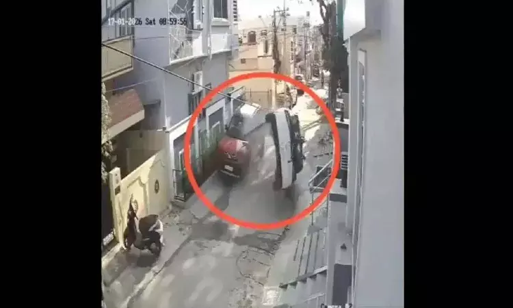 Car flips, hitting parked vehicle,Hyderabad, Neredmet
