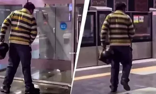 Man caught urinating, Delhi Metro station, outrage, video viral, DMRC