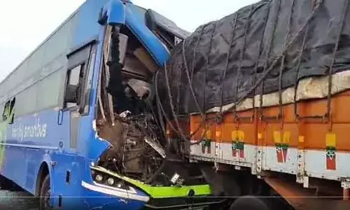 Kodad Bypass Accident, Suryapet Road Accident, Travels Bus Lorry Collision, National Highway 65, Hyderabad to Eluru Bus, Passenger Safety, Kodad Government Hospital