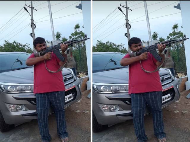 పోలీసు తుపాకీతో టీఆర్ఎస్ కార్పొరేటర్ భర్త హల్ చల్